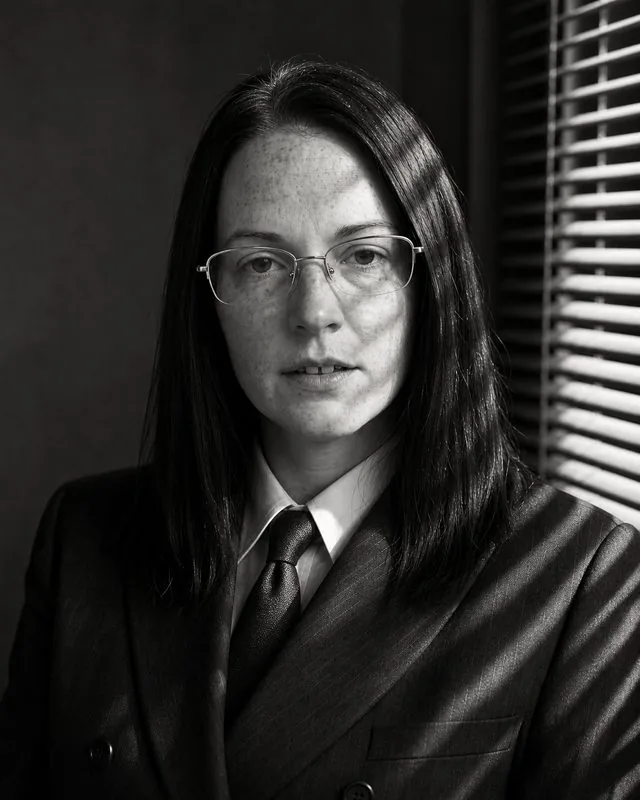 Film noir: a black and white noir portrait in a double-breasted suit and tie